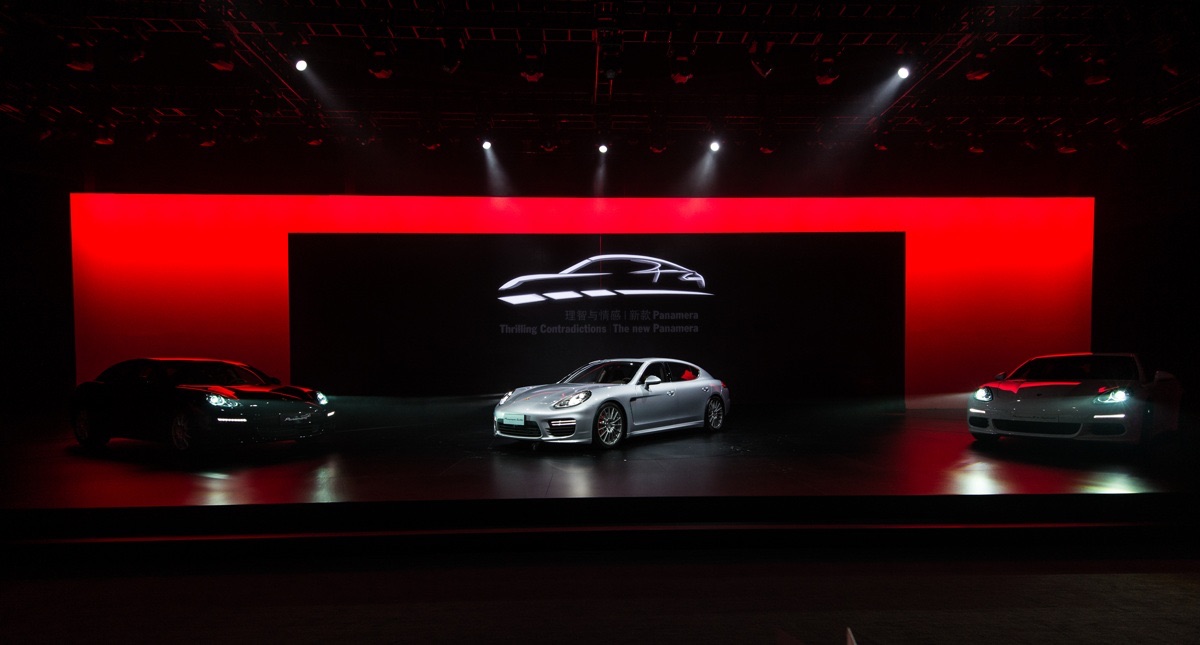 Porsche Panameras on stage at the final moment of the show.